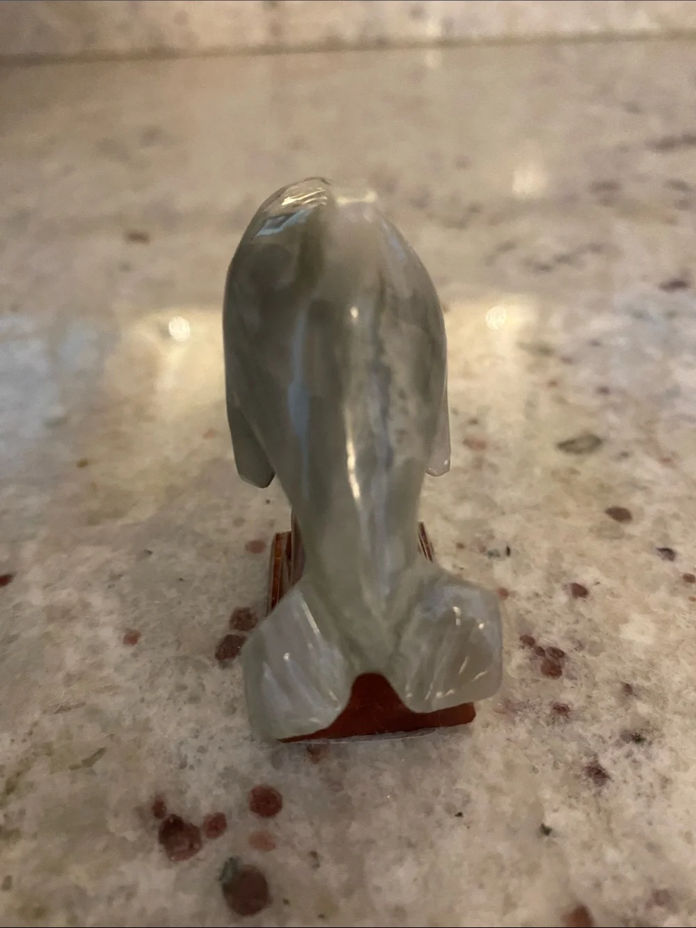 Stone dolphin figure. NWT about 1.5x2.5 in. Summer